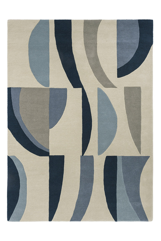 A Harlequin Torillo Sky/cornflower 143908 rug with an abstract geometric pattern in blue and gray tones on a beige background.