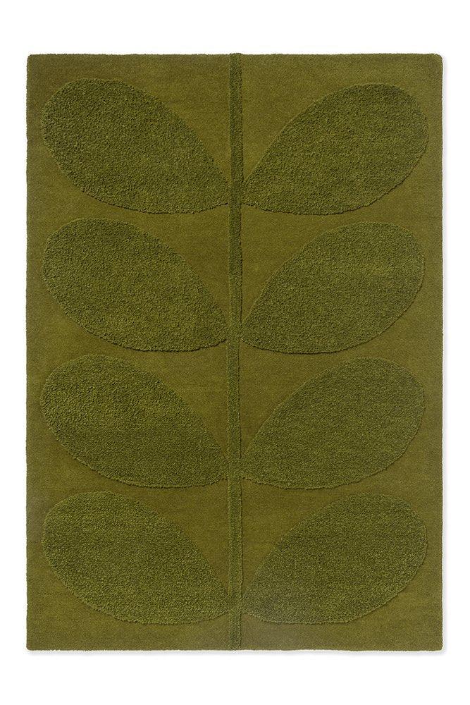 A green Orla Kiely Solid Stem Fern rug with a floral pattern and a subtle pink border.