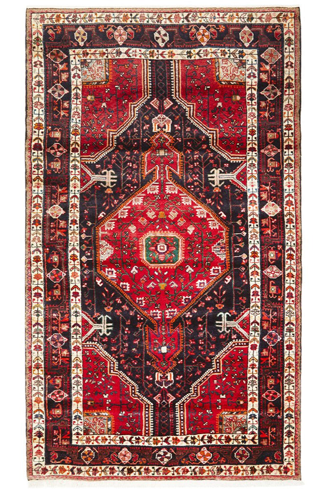 A hand knotted pure wool Tuyserkan rug with a geometric pattern, predominantly red with intricate designs
