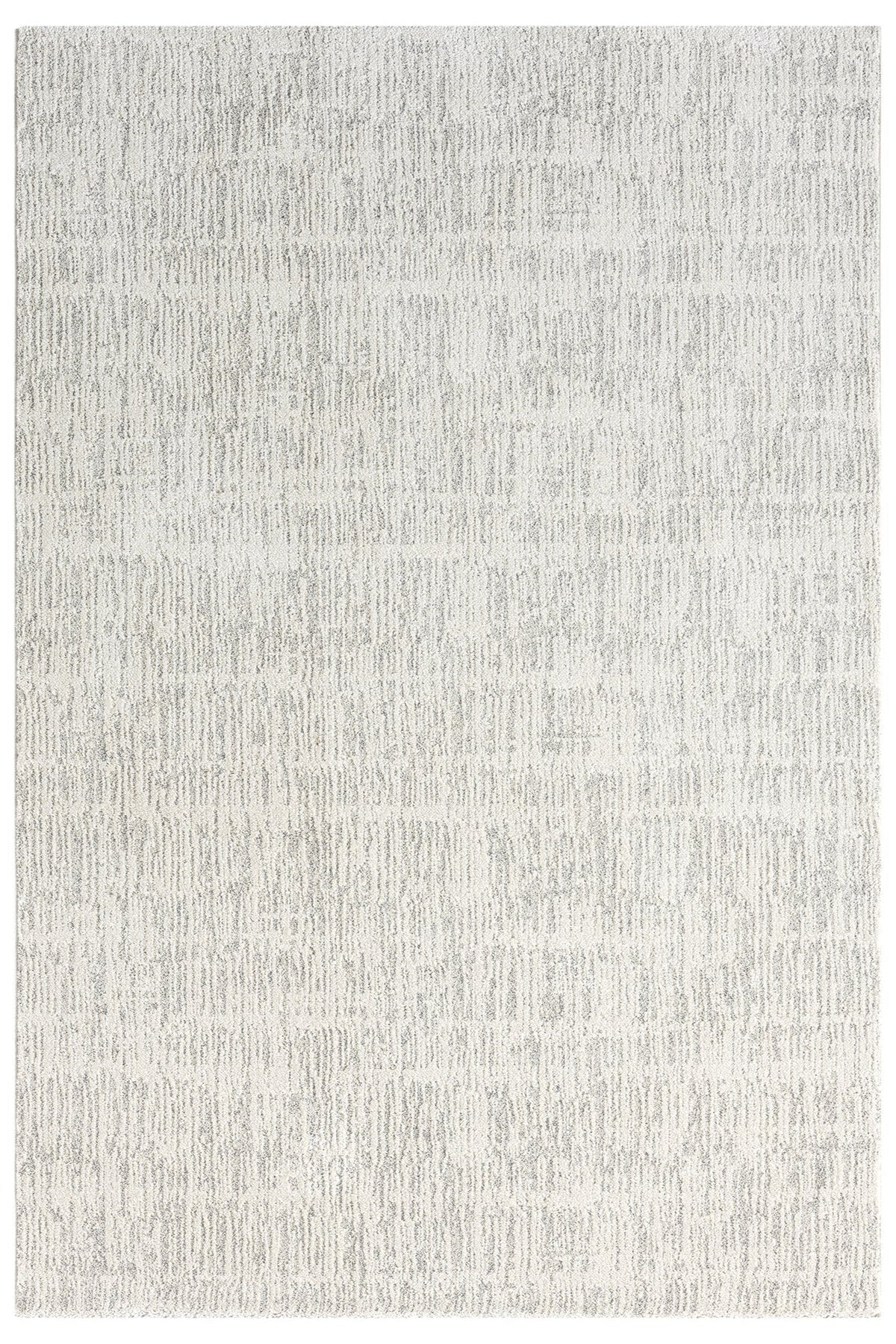 A rectangular, flatweave area rug in a natural oyster color with a texture that resembles jute.