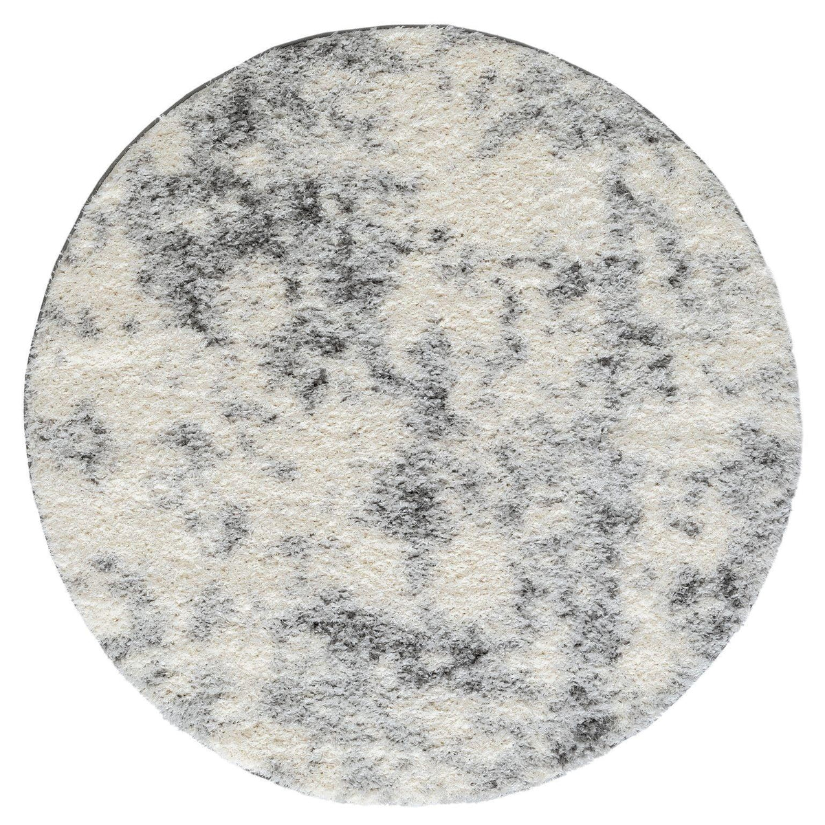 A round, shaggy area rug with a mottled ash color pattern.