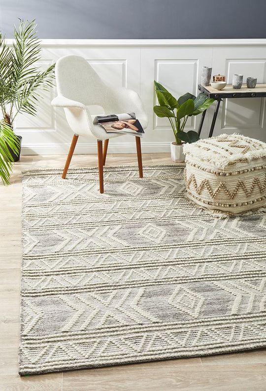 Charita Hand loomed Wool Rug  Natural